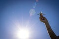 Plane banner. Toy airplane flight in air, travel concept. Aircraft fly in sunlight blue sky in pilot hand on bright sun