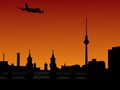 Plane and Berlin skyline Royalty Free Stock Photo