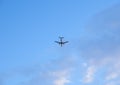 Plane in the blue sky