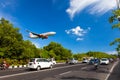 Plane danger landing near road on the tropical island Bali, Ngurah Rai Airport, Tuban, Badung Regency, Bali, Indonesia