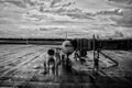 The plane is disembarking passengers via aerobridge Royalty Free Stock Photo