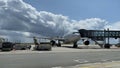 Plane docked at the jetway at the airport ready to fly to its next destination