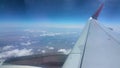 The plane flies over the clouds and Nepal. Shevelev.