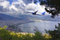 The plane flies over the Mediterranean Sea over the Turkish resort towns. Royalty Free Stock Photo
