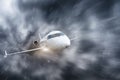 The plane flies during a storm and heavy rain overcast