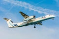 Plane from Flybe Olympic Air Dash 8 G-ECOE is preparing for landing Royalty Free Stock Photo