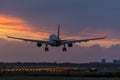 Plane is flying above the runway.