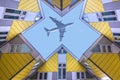 Plane flying over the cubic houses at Rotterdam