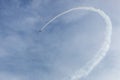 Plane flying upside down upon the lake Royalty Free Stock Photo