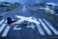 A plane gets ready to takeoff from Tenzing Hillary airport in Khumbu, Solukhumbu district, Nepal. Also known as Lukla airport, it