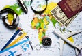 plane, globe, passport, dollars, compass, clock, magnifier, knife on the world map, travel turizm concept Royalty Free Stock Photo