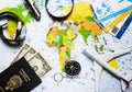 plane, globe, passport, dollars, compass, clock, magnifier, knife on the world map, travel turizm concept Royalty Free Stock Photo