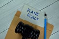 Plane Hijack text on document above brown envelope with gavel Royalty Free Stock Photo