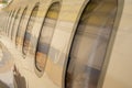 A plane with its windows open and a reflection of the sky in the windows. Royalty Free Stock Photo