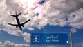 Plane landing in Abu Dhabi United Arab Emirates, UAE airport with signboard