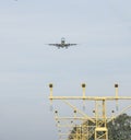 Plane landing at amsterdam airport Royalty Free Stock Photo