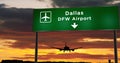 Plane landing in Dallas DFW with signboard Royalty Free Stock Photo