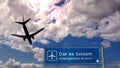 Plane landing in Dar es Salaam Tanzania airport with signboard Royalty Free Stock Photo