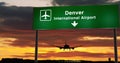 Plane landing in Denver with signboard