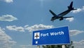 Plane landing in Fort Worth, Dallas Texas, USA airport with signboard