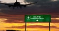 Plane landing in Hanoi Vietnam airport with signboard