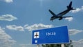 Plane landing in Ibiza Spain airport with signboard