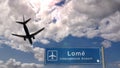 Plane landing in Lome Togo airport with signboard