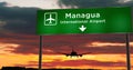 Plane landing in Managua Nicaragua airport with signboard
