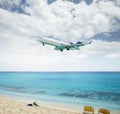 Plane landing over Maho Beach in Saint Martin island
