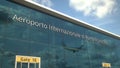 Commercial plane landing reflecting in the windows with Aeroporto di Roma or Rome Airport text. 3d rendering