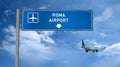 Plane landing in Roma with signboard