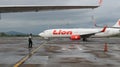 a plane from the Lion Air airline that was landing at Sultan Hassanudin Airport Royalty Free Stock Photo