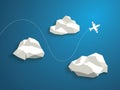 Plane and low polygonal clouds on blue sky Royalty Free Stock Photo