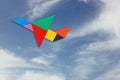 Plane made from tangram puzzle. sky background Royalty Free Stock Photo