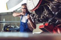 Plane Maintenance Engineer Repairing Engine Royalty Free Stock Photo