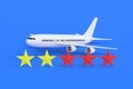 Plane near two yellow and three red stars on blue Royalty Free Stock Photo