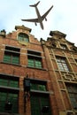 Plane over the city of Brussels tilt - shift Royalty Free Stock Photo