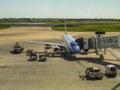 Plane Parked at Airport Royalty Free Stock Photo