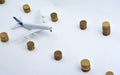 Plane plastic toy with coins isolated on white Royalty Free Stock Photo