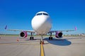 The plane is on the platform of the airport. Blue sky. Travel. Flights by air. Runway. Close-up, copy space. Passenger airplane Royalty Free Stock Photo