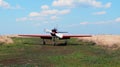 The plane with propeller and red wings Royalty Free Stock Photo