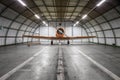 Plane on repair in a big hangar. Single turboprop aircraft in big hangar Royalty Free Stock Photo
