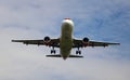 A plane from the side approaching for landing. Royalty Free Stock Photo