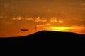 Plane silhouette on a sunset background Royalty Free Stock Photo