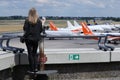 Plane spotter girl watching planes