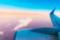 Plane In Sunset Sunrise Sky. View From Airplane Window On Height Flight Of Plane. Travel And Transportation Concept Royalty Free Stock Photo