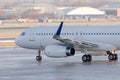 The plane is taxiing to the steering track before takeoff, close-up view Royalty Free Stock Photo