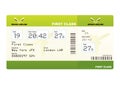 Plane ticket first class green Royalty Free Stock Photo