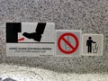 Plane toilet interior sign. Translation: Step to open waste flap sign. Royalty Free Stock Photo