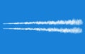 Plane track isolated on blue background Royalty Free Stock Photo